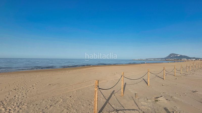 Foto 51221f26-c3bc-4685-826e-45ee3db51b65. Casa aparellada amb aparcament a Oliva nova Oliva