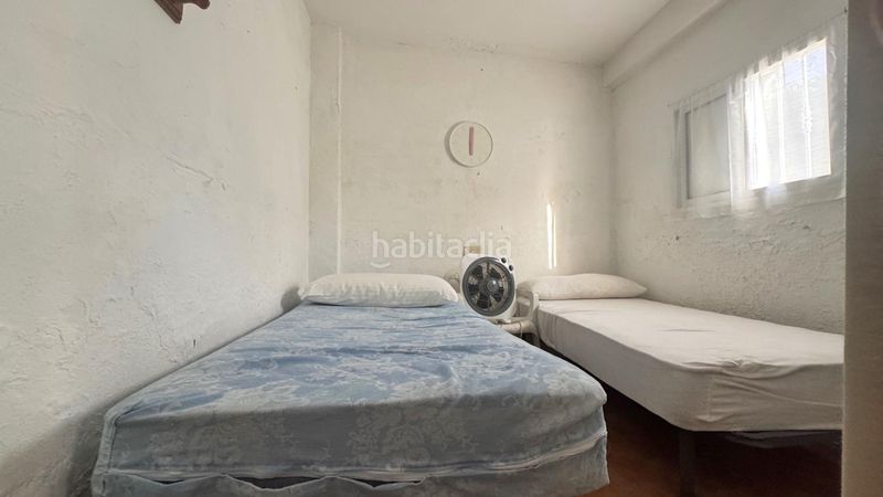 Foto 524b5d02-2d95-4dfb-a79a-ae4daf98ed14. Casa aparellada amb aparcament a Oliva nova Oliva