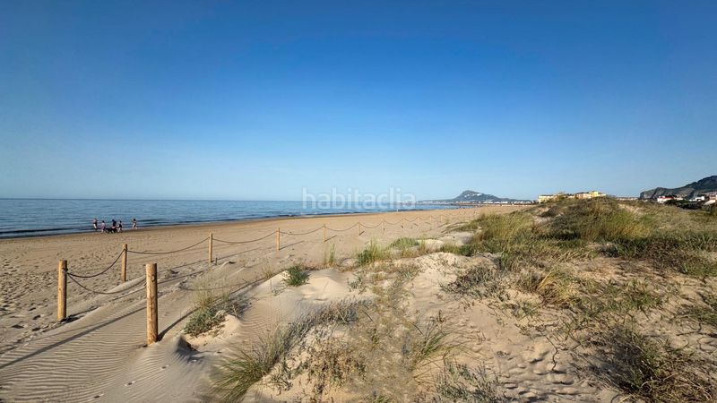 Foto 5ba1759a-25a9-42f2-b556-319da763f263. Casa aparellada amb aparcament a Oliva nova Oliva