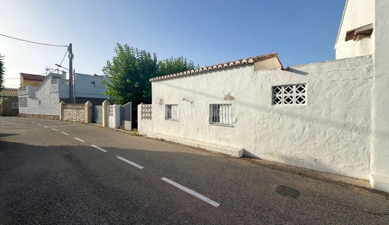 Foto 63e7d21d-e5ce-4438-bb8e-16df51a31366. Casa aparellada amb aparcament a Oliva nova Oliva