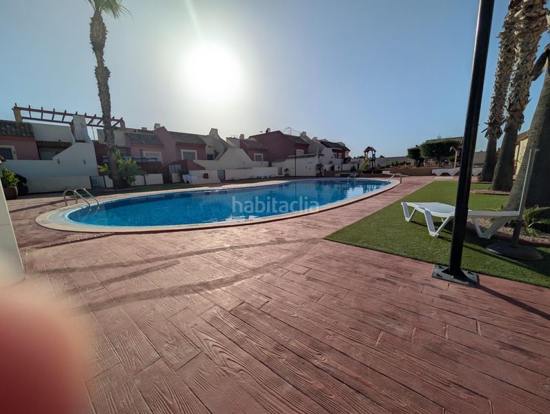 Foto 6536ff74-20cd-471e-bbc6-c02bc1cd1399. Casa adossada amb piscina a Mazarrón casco urbano Mazarrón