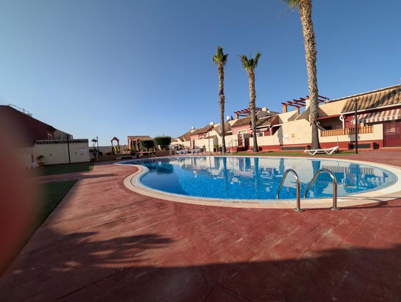 Foto c23c9c6e-e4ce-46e7-b738-6808e6da4e73. Casa adossada amb piscina a Mazarrón casco urbano Mazarrón