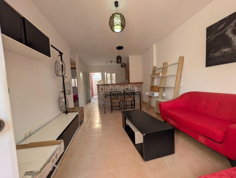Foto cbff47e6-b134-4ef6-b7de-d5534f57c909. Casa adossada amb piscina a Mazarrón casco urbano Mazarrón