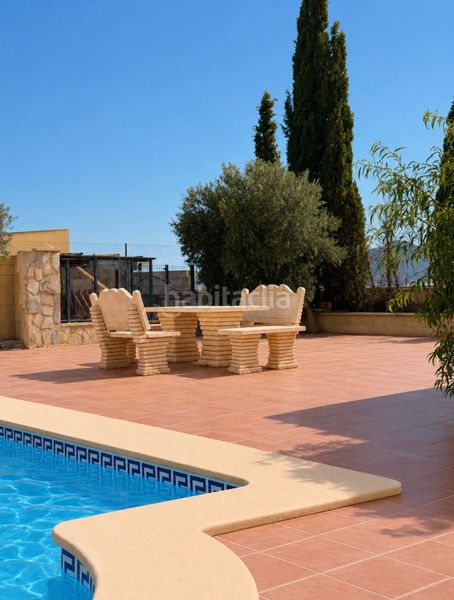 Foto e5200da1-0ca8-4be5-9c97-cc2fe7b28e0b. Xalet amb xemeneia aparcament piscina a Moralet Alicante