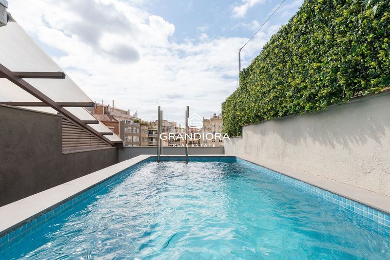 Foto 2710d563-5ce3-4d5a-935a-38ab37b41279. Àtic amb aparcament piscina a Vila de Gràcia Barcelona