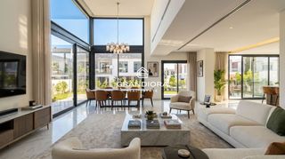 Chalet  Montserrat roig. Villa de obra nueva con vistas al mar y piscina privada en una d