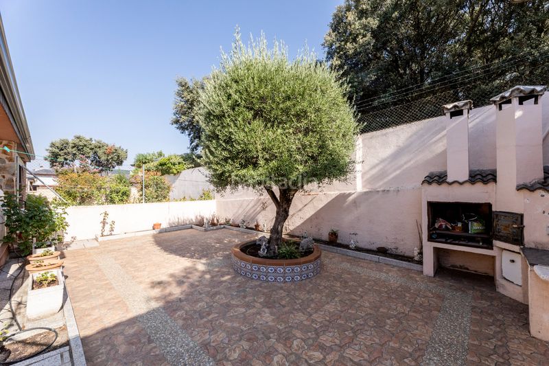 Foto eca99316-c8c0-4895-b9a5-e9e4b1315ff4. Casa aparellada amb xemeneia calefacció a Alpedrete