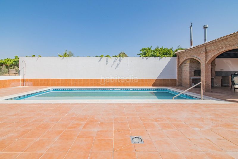 Foto 314b6138-c9bd-452c-bbcf-a33cd88fe509. Chalet avec chauffage parking piscine dans Atarfe