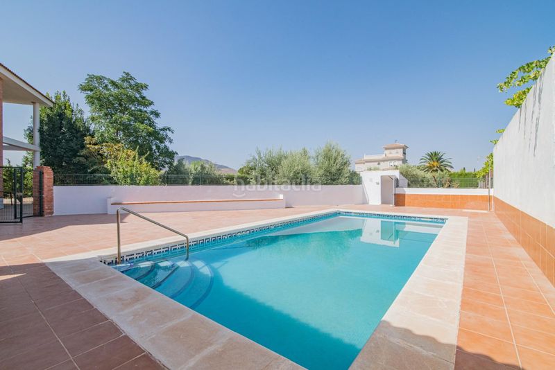 Foto c5d848a8-44cb-4229-a1e7-915cc62b1f88. Chalet avec chauffage parking piscine dans Atarfe