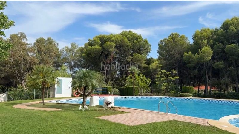 Foto 3192c673-e51d-4fbd-9b38-65ab41e34fd1. Casa adossada amb calefacció aparcament piscina a Nucia (la)
