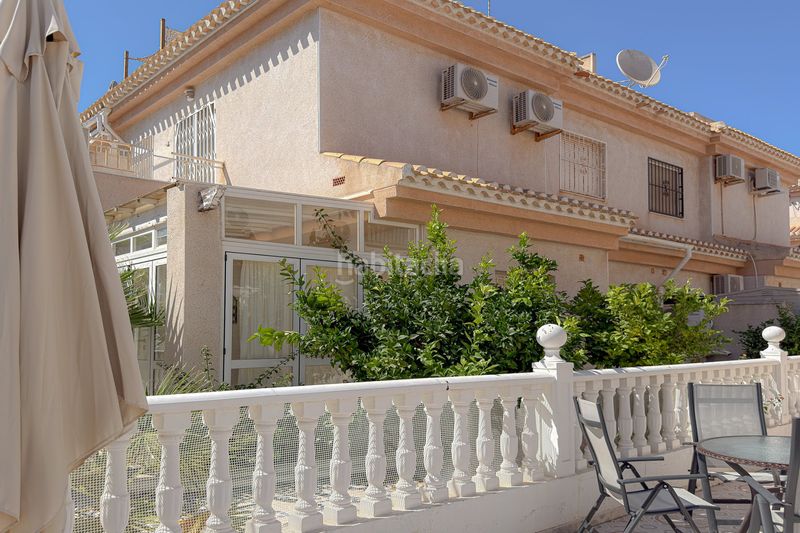 Foto 7a9851e3-3016-40a8-8f96-c018e4d78bdc. Casa aparellada chalet pareado de 3 dormitorios con solárium, vistas al mar y piscina – la zenia, costa a Orihuela