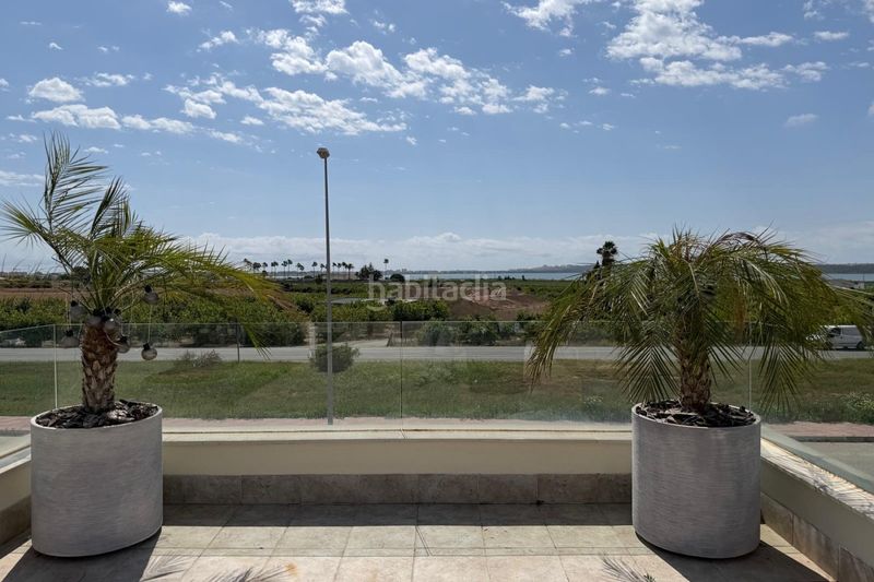 Foto 0426e00a-863b-4072-80bc-4f2ef60b75c4. Xalet chalet seminuevo con piscina privada y solárium con vistas a la laguna rosa – ciudad quesada a Rojales