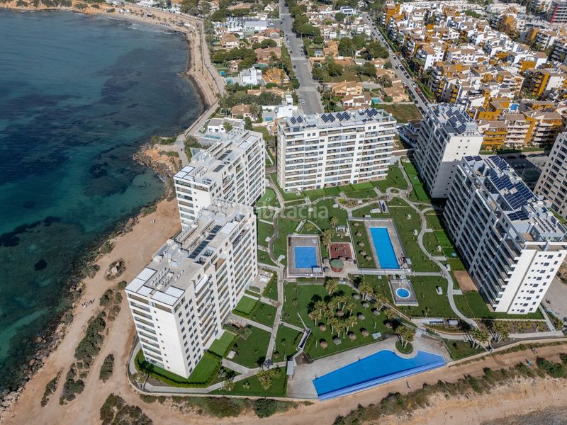 Foto 13b9c58e-8e62-4b43-b4aa-fb7f6533447b. Apartament amb aparcament piscina a Punta Prima Torrevieja