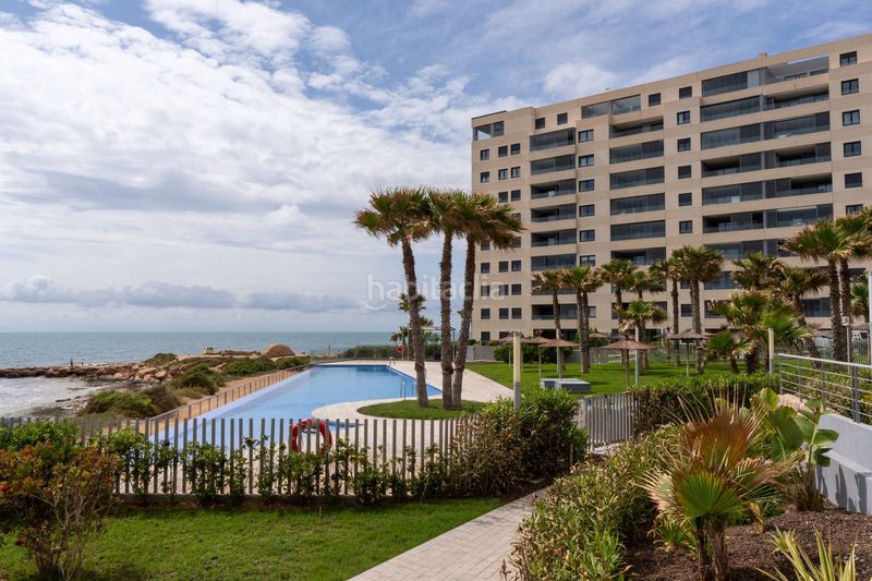 Foto 3524188c-387c-4c4f-911f-5c1c4037efe2. Apartament amb aparcament piscina a Punta Prima Torrevieja