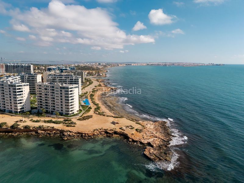 Foto 7f9d68f2-14ed-49fe-ad17-224dbbcb2a02. Apartament amb aparcament piscina a Punta Prima Torrevieja