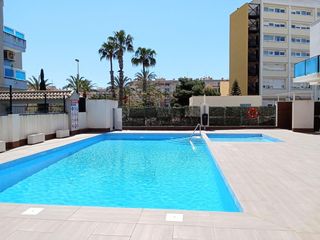 Apartament  N/a. Moderno apartamento orientado al sur con piscina comunitaria!