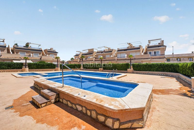 Foto 548a6170-abb1-48c5-bc05-3878e5d3b3ca. Casa adossada amb aparcament piscina a Lomas de Cabo Roig - Los Dolses Orihuela