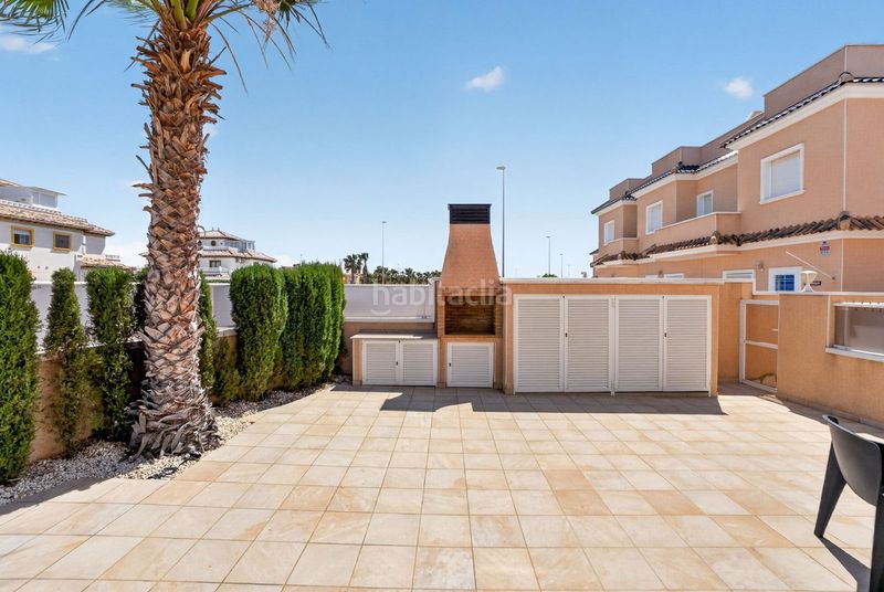 Foto 80b394ea-60fe-4002-aab9-adae97e29349. Casa adossada amb aparcament piscina a Lomas de Cabo Roig - Los Dolses Orihuela
