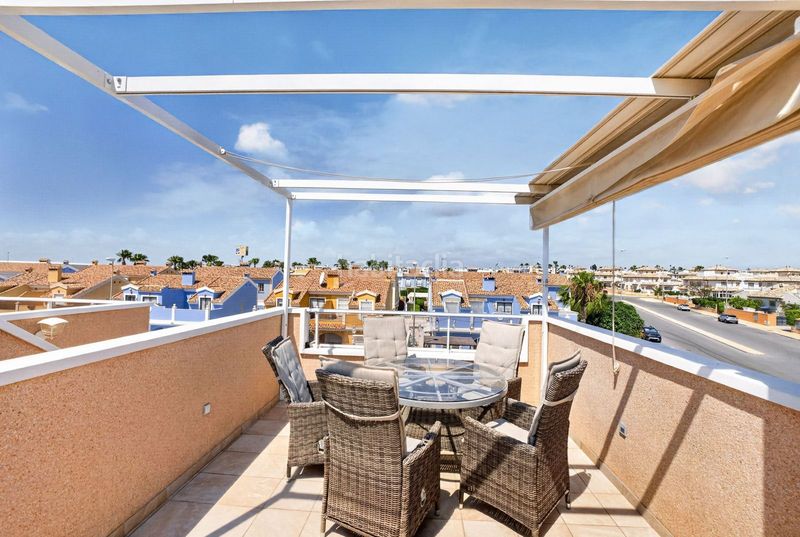 Foto b94917ad-6e7e-4a67-bd00-6328d63e85b2. Casa adossada amb aparcament piscina a Lomas de Cabo Roig - Los Dolses Orihuela