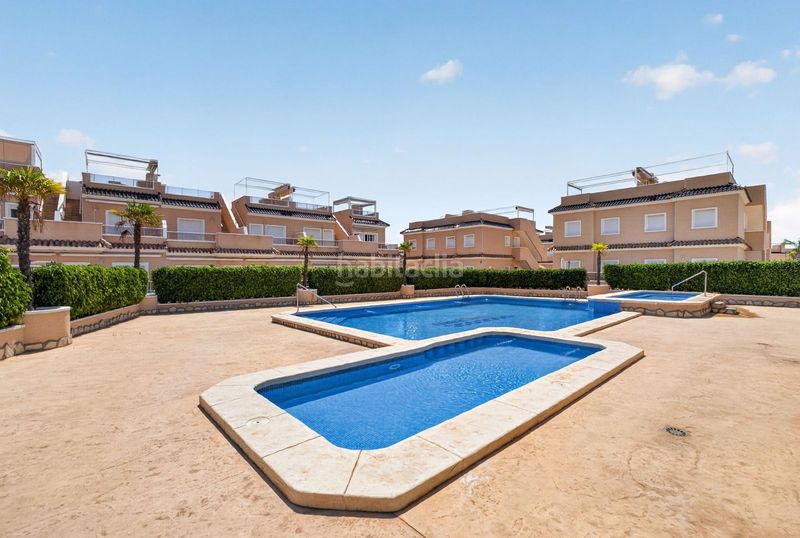 Foto d65b1b23-d6d2-4d30-b1a6-cbb33584f964. Casa adossada amb aparcament piscina a Lomas de Cabo Roig - Los Dolses Orihuela