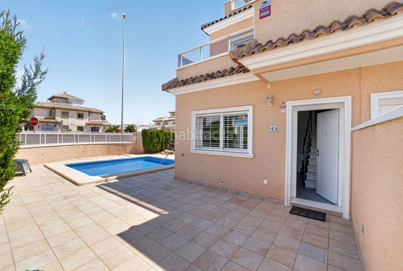 Foto df246876-fd67-46fc-8bca-fe7775f2c365. Casa adossada amb aparcament piscina a Lomas de Cabo Roig - Los Dolses Orihuela