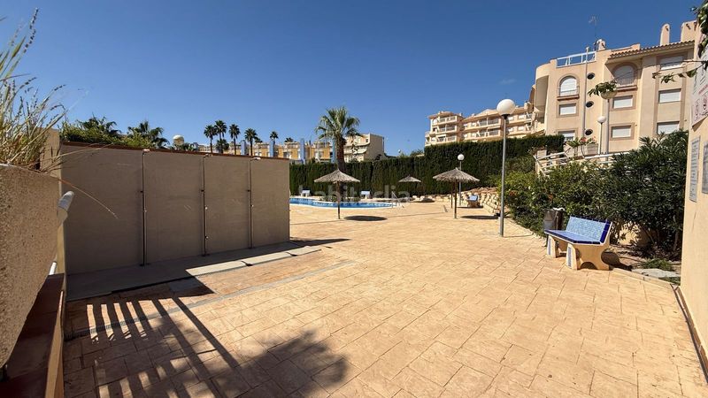 Foto 67b42544-cb49-49fa-9530-cd0d020018fc. Apartament amb aparcament piscina a Aguamarina Orihuela