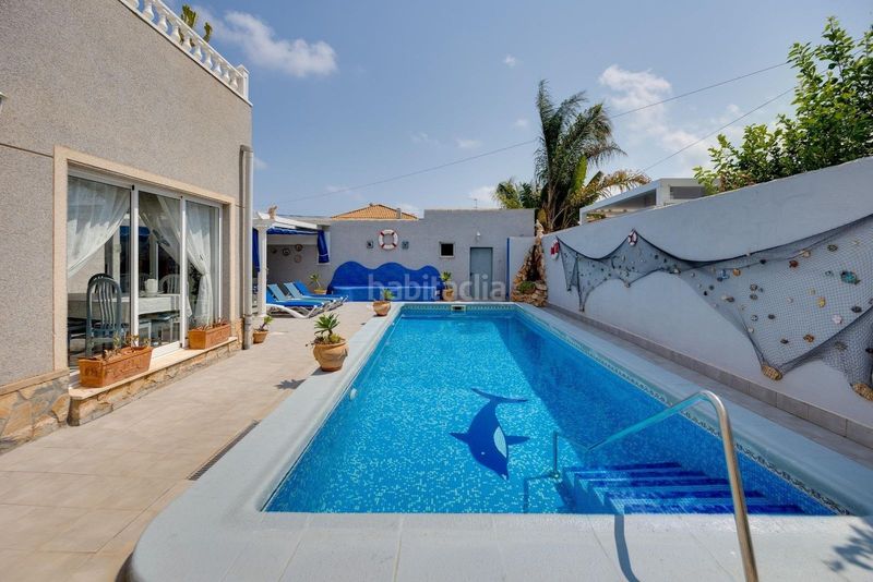 Foto 4659ee8a-d295-4a8a-a3a3-e7f8d6ce8658. Xalet amb aparcament piscina a Aguamarina Orihuela