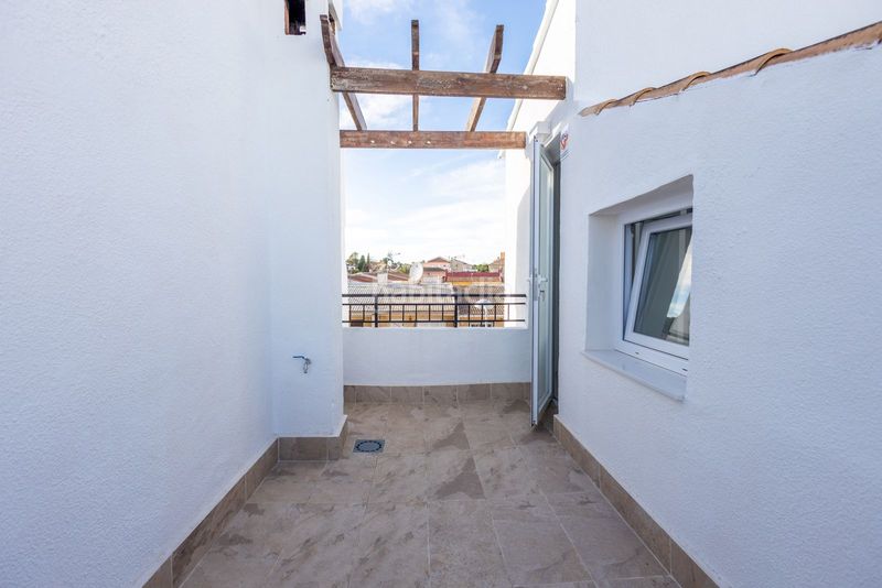 Foto c6c3a27b-ba75-45de-9bf5-3b63c5b62e5f. Casa adossada amb piscina a Los Balcones-Los Altos Torrevieja