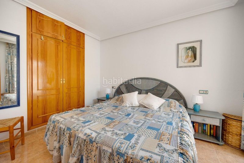 Foto 86cad6e1-8ba2-4bab-b8f2-d6a6896a88a8. Casa adossada amb piscina a Playa Flamenca Orihuela