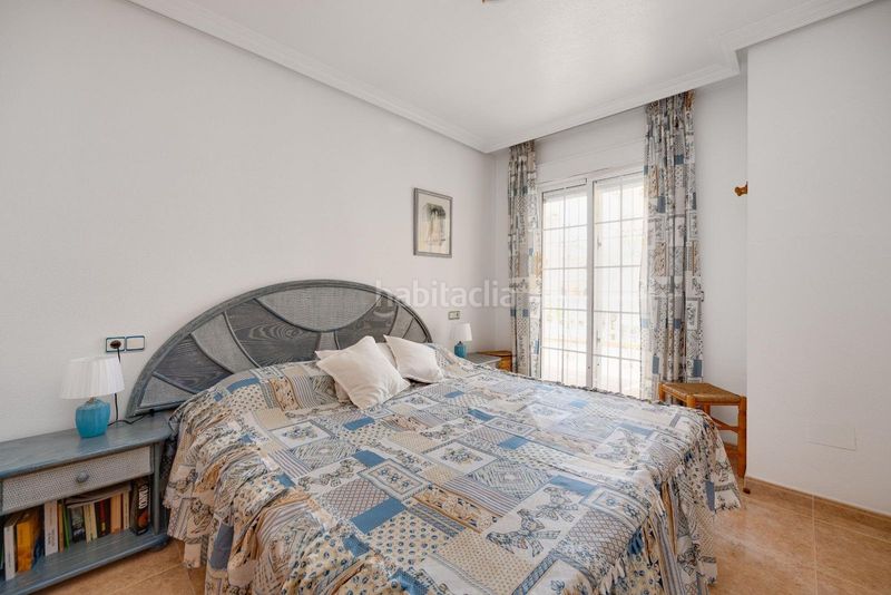 Foto ca721d74-73c9-41af-8cf7-d6df10bd69cb. Casa adossada amb piscina a Playa Flamenca Orihuela