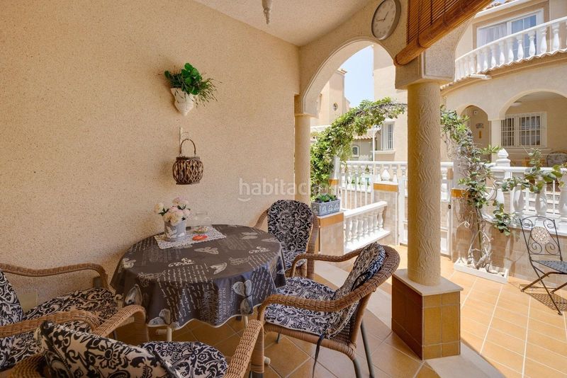 Foto f04212e1-18a0-498a-9494-82585c3cc51c. Casa adossada amb piscina a Playa Flamenca Orihuela