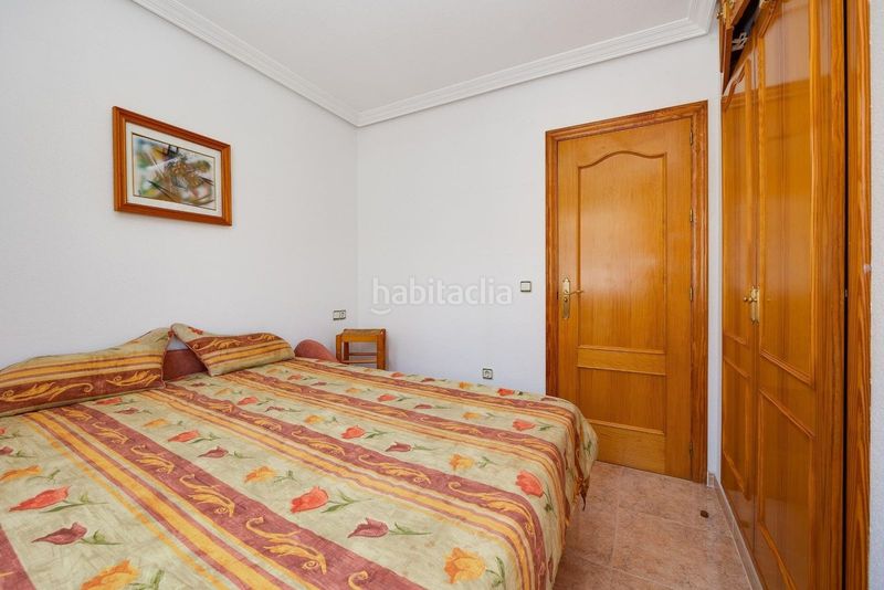 Foto f5e87e91-5ba1-4088-8177-6bb6a15113bb. Casa adossada amb piscina a Playa Flamenca Orihuela