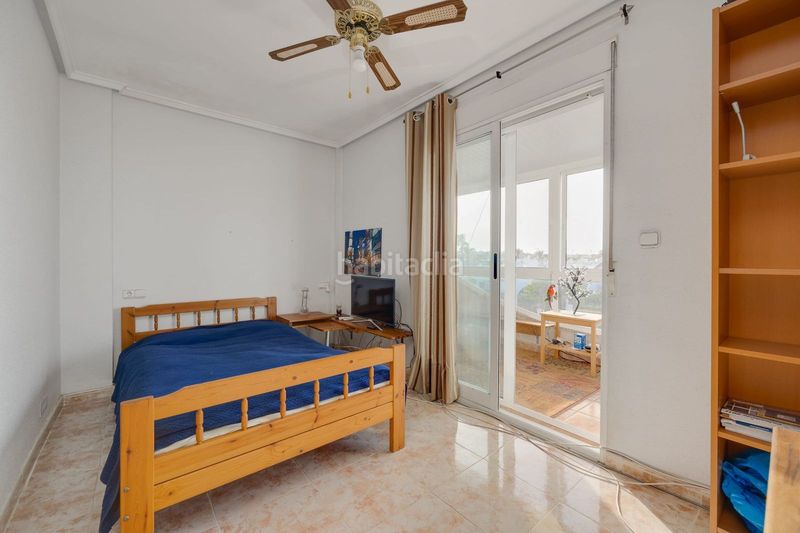 Foto f33c7a1a-ab52-4ec0-80bd-a49bd4039ce0. Casa adossada amb aparcament piscina a Playa Flamenca Orihuela