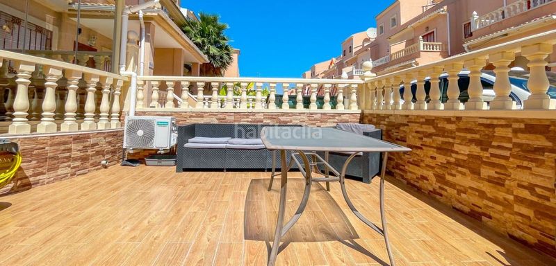 Foto 0b6c1e47-c594-40cc-ba0a-fe78c01f8dd5. Casa adossada amb piscina a Playa Flamenca Orihuela