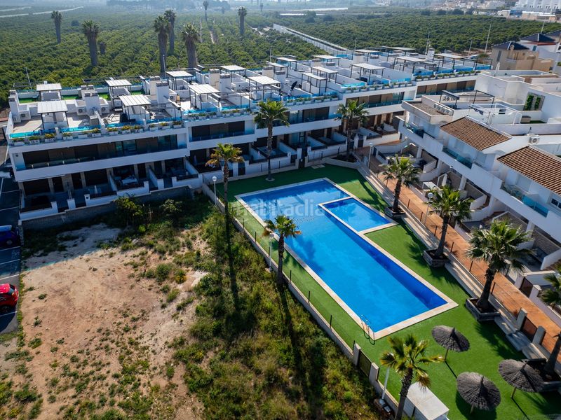 Foto e1cf6201-7a65-4ce3-82cd-1d9305677ed8. Casa adossada amb aparcament piscina a Los Balcones-Los Altos Torrevieja