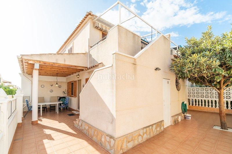 Foto c7ff73a5-28f8-42ca-b6c7-bf4a140eddc8. Casa a schiera con piscina in Playa Flamenca Orihuela