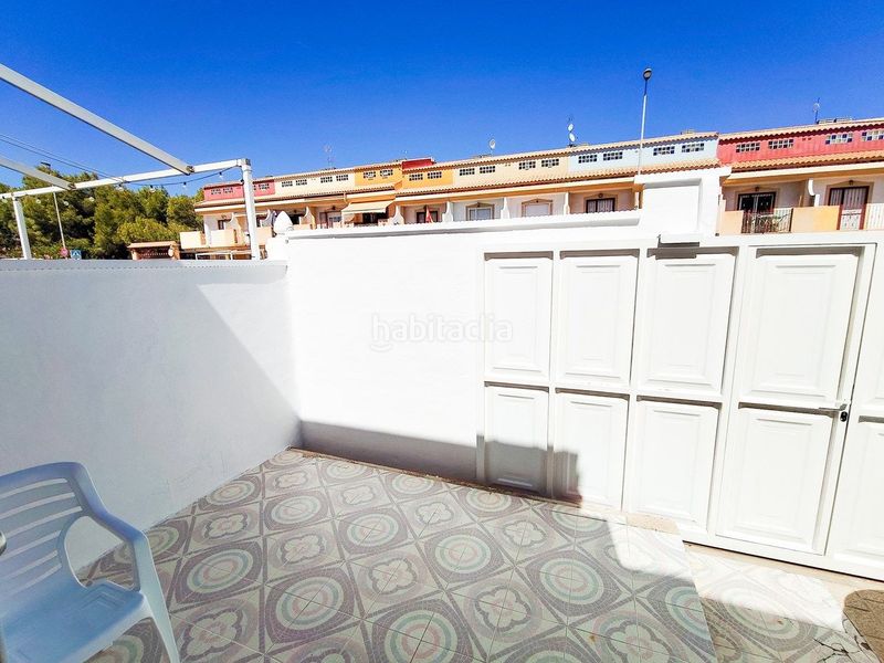 Foto 1d1cf33b-1e5e-41b5-87b8-90442cb8348f. Casa adossada amb aparcament piscina a Playa Flamenca Orihuela