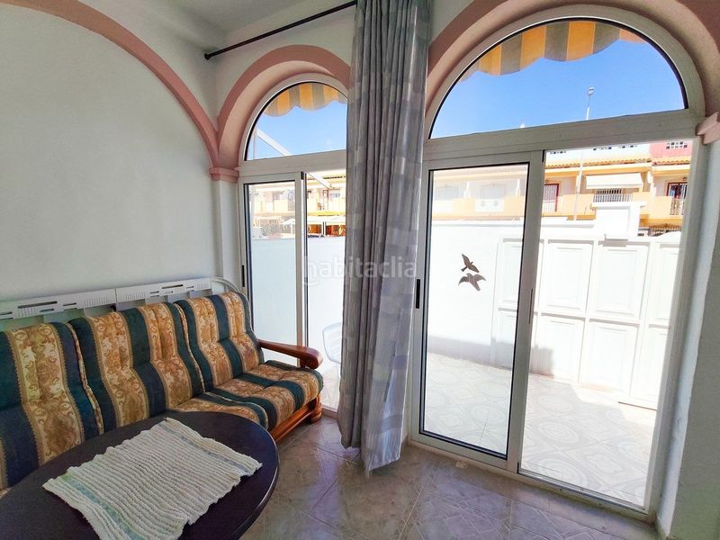 Foto 34419f6a-d3f6-44ba-b2f2-137a1599d64e. Casa adossada amb aparcament piscina a Playa Flamenca Orihuela