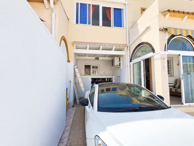Foto 566d10b6-1f3e-42a3-93b5-73b883ef6fc1. Casa adossada amb aparcament piscina a Playa Flamenca Orihuela