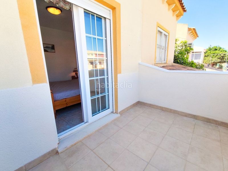 Foto 5a4e359b-4640-4dd7-9c6a-bfb32ca2f0ff. Casa adossada amb aparcament piscina a Playa Flamenca Orihuela