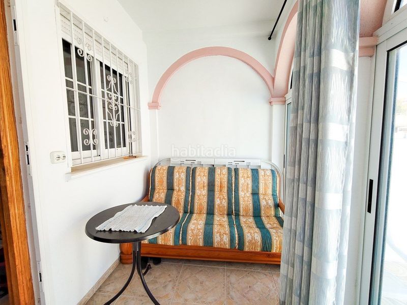 Foto a75e2b1b-a7a4-41eb-a8ad-e417125b7c30. Casa adossada amb aparcament piscina a Playa Flamenca Orihuela