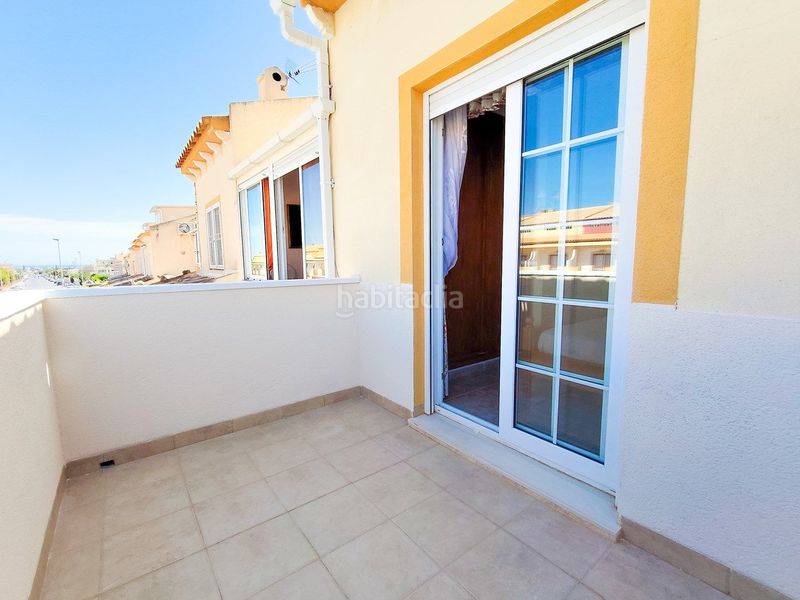 Foto b4998185-8877-4e59-a3c2-803942419cec. Casa adossada amb aparcament piscina a Playa Flamenca Orihuela
