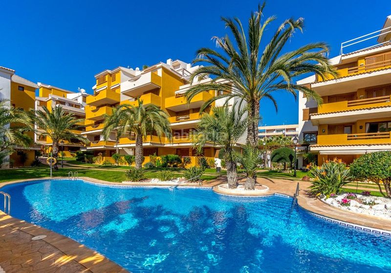 Foto 27200645-c9dd-4f87-8919-7c439c27fa0f. Apartament amb piscina a Punta Prima Torrevieja