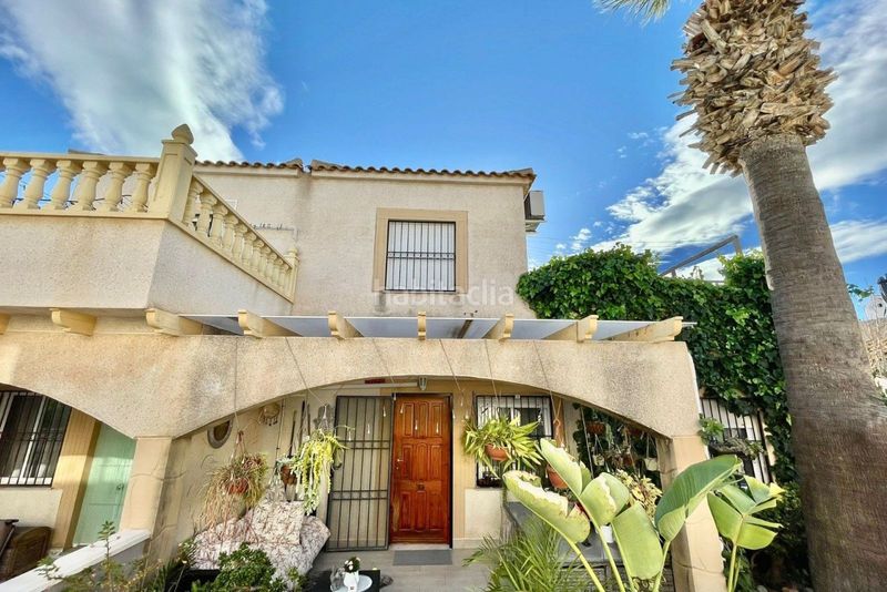 Foto 0d368cb4-9e0b-49c2-b2cf-9fbed3f18d89. Casa adossada a Playa Flamenca Orihuela