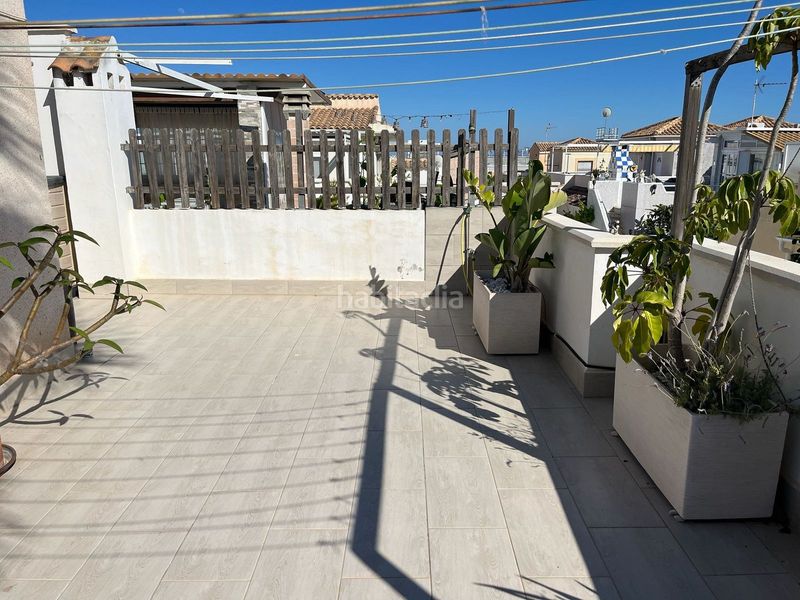 Foto 393ee799-2862-4035-ac6a-cd1fb54652b3. Casa adossada a Playa Flamenca Orihuela