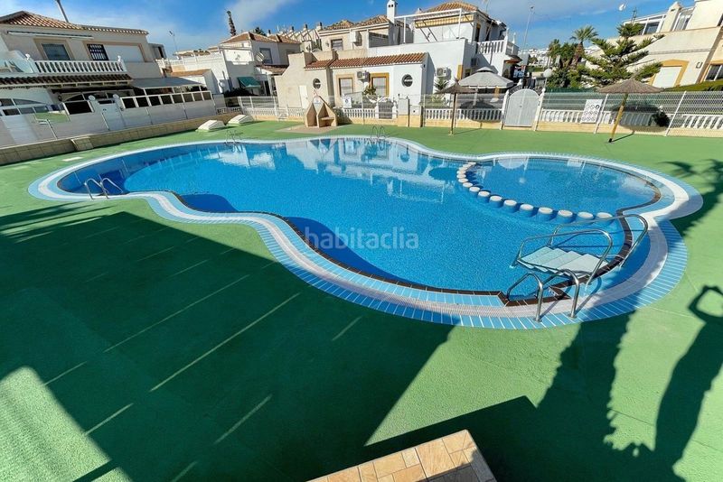 Foto 681c08b5-9115-48e0-b215-3ed34969bf55. Casa adossada a Playa Flamenca Orihuela