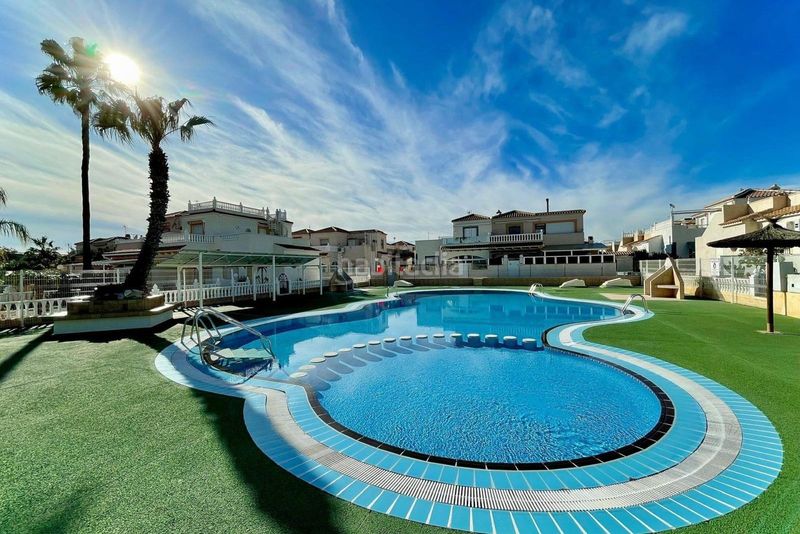 Foto adbd4a59-2747-49f1-8dd1-d5982fa941a5. Casa adossada a Playa Flamenca Orihuela