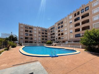 Apartament a Calle azorin 22. Apartamento con piscina a menos de 50 metros de la playa en guar