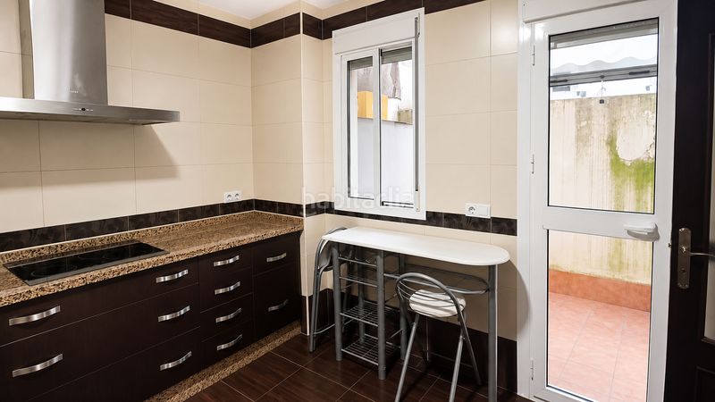 Foto 195d1386-eb29-4da4-a10b-4217d59759ed. Casa adossada a Lora del Río