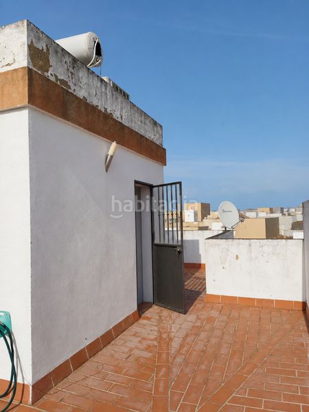 Foto 82084a09-f28b-4456-90d7-7b01688c69da. Casa adossada a Lora del Río
